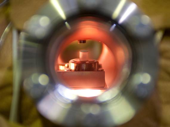 A liquid-nitrogen-cooled GaAs photocathode producing electron beams with internal temperatures down to 10 K
